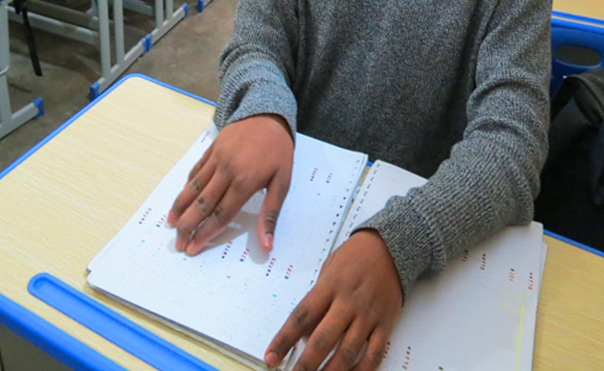 Blind Students Reading